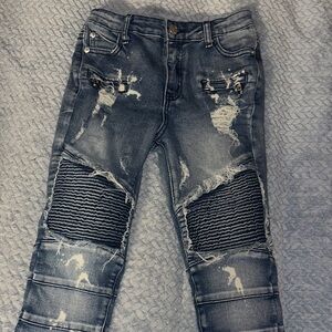 Distressed Blue Denim Jeans with Ribbed Accents